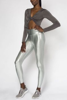 Description: Full length legging. Fitted. Supportive high rise waistband, for a comfortable fit that smooths and flatters. Approx. 3" waistband. Power mesh lining at waistband, for comfort & breathability. Moisture wicking. 4-way stretch. Breathability. Reinforced gusset. Flatlock seams, to prevent chafing and add durability. Smooth performance fabric. Made in the USA. Why We Love: Love the chic metallic finish & supportive waistband!Fabric: 80% Nylon, 20% Spandex. Care: Machine wash cold, insid Iridescent Fabric, Cupro Fabric, Spandex Leggings, Metallic Fabric, Athleisure Wear, Loungewear Set, Performance Fabric, Black Jumpsuit, The Chic