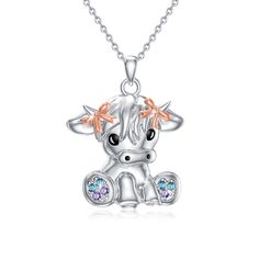 Discover our exquisite Sterling Silver Highland Cow Pendant Necklace, elegantly crafted with sparkling Cubic Zirconia and a stunning blend of silver and rose gold tones, designed to add a touch of whimsical charm to any womans jewelry collection. Our Highland Cow Pendant Necklace features premium Sterling Silver and dazzling Cubic Zirconia stones, artfully arranged to capture the beauty and spirit of the beloved Highland cow. The unique combination of silver and rose gold accents creates a harmo Cow Pendant, Cow Necklace, Scottish Cow, Easter Wedding, Unique Butterfly, Necklace For Girls, Butterfly Tattoos, Highland Cattle, Silver Necklaces Women