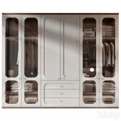 a white closet with glass doors and shelves filled with clothes on top of each shelf