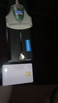 a close up of a credit card attached to a device