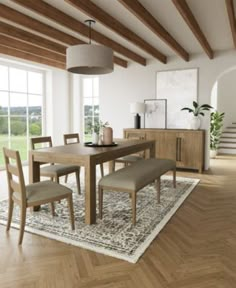 a dining room with wooden floors and white walls