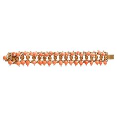 Antique Coral and Seed Pearl Gold Fringe Bracelet Discover the timeless elegance of our Antique Gold Coral and Seed Pearl Fringe Bracelet, a stunning piece that seamlessly blends late 19th Century charm with modern style. This exquisite bracelet features vibrant coral and delicate seed pearls, creating a playful fringe design that adds a touch of fun to any outfit. The rich gold setting beautifully enhances the natural hues of the coral, making it a standout accessory for both casual and formal Pearl Fringe, Fringe Bracelet, Gold Fringe, Seed Pearl, Coral Beads, Gold Set, Pearl Bracelet, Link Bracelets, Antique Gold