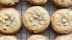 a bunch of cookies sitting on top of a cooling rack