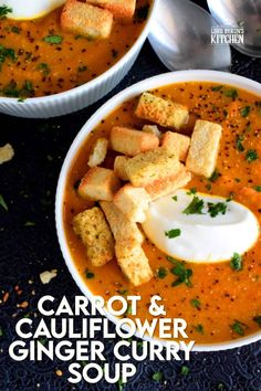 two bowls of carrot and cauliflower ginger curry soup with bread croutons