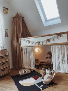 a room with a bed, rugs and other items on the floor in front of it