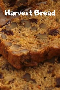 sliced loaf of bread with raisins on top and the words harvest bread above it