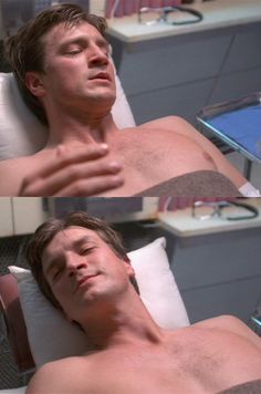 a shirtless man laying in a hospital bed with his arm wrapped around the pillow