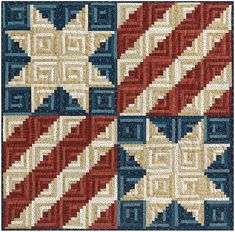 a red, white and blue rug with an intricate design on the bottom half of it