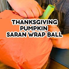 a man is carving pumpkins with the words thanksgiving pumpkin saran wrap ball