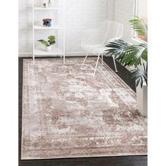 an area rug with white and brown colors in a living room next to a window