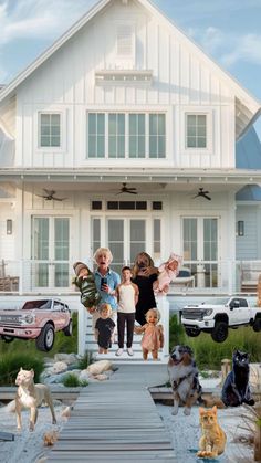 a group of children and dogs standing in front of a house