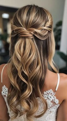 Looking for the perfect hairstyle for your big day? If you’re a bride, bridesmaid, or simply a wedding enthusiast, you’re in the right place! Half up half down hairstyles offer a charming and versatile option, combining the elegance of an updo with the free-flowing beauty of loose locks. In this blog post, we'll explore 15 stunning half up half down wedding hairstyles that are sure to turn heads and make you feel like a princess. Whether you have Boho Half Up Half Down Hairstyles Wedding, Long Wedding Hair Half Up Half Down, Half Up Half Down Wedding Hair Medium, Hairstyles For Occasions, Bridesmaid Hair Half Up Half Down Medium Length, Boho Bridal Hair With Veil, Wedding Hair Half Up Half Down With Veil, Wedding Hairstyles Half Up Half Down With Veil, Wedding Hair For Bride With Veil