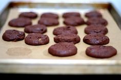 chocolate cookies on a baking sheet ready to be baked in the oven or used as an appliance