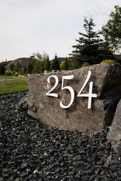 a large rock with the number twenty five on it