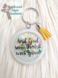 a keychain with the words and god says that he was good on it