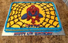 a birthday cake with a spiderman on it