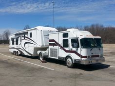 an rv is parked in a parking lot