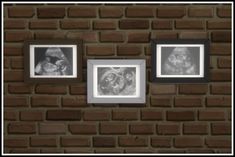 three black and white photos hanging on a brick wall next to two framed pictures with an infant's head