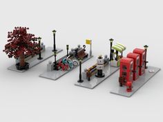 three different types of legos sitting on top of each other in front of trees