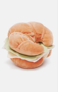 a stuffed animal burger is shown on a white background