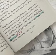 an open book with writing on it and a photo of a woman's face