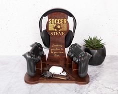 Elevate your gaming experience this holiday season with our charming Christmas Soccer Gamer Controller Headphone Stand! Perfectly designed for the passionate player, lover, or fan, this unique gift is an ideal choice for dads, husbands, boyfriends, sons, and brothers who live and breathe soccer. Crafted with love and attention to detail, this stand not only keeps your gaming gear organized but also adds a festive touch to any gaming setup. Whether it's a birthday surprise or a special Christmas treat, this stand is sure to delight any soccer enthusiast. Celebrate their passion for the game with a gift that combines functionality and flair, making every gaming session a joyful experience! 🎮 Custom wood stand for gaming controllers and headphones Personalized with football team design for f Gamer Controller, Football Lover Gifts, Special Games, Gamer Room Decor, Headphone Stand, Team Design, Headphone Stands, Christmas Gifts For Boys, Unique Birthday Gift