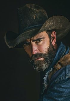 a man with a beard wearing a cowboy hat