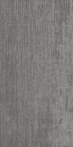 a gray carpet with vertical lines on it