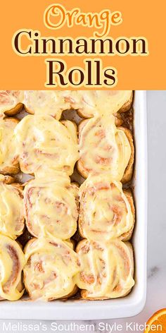 orange cinnamon rolls in a baking dish with text overlay that reads orange cinnamon rolls