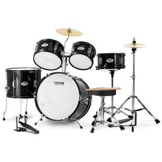 a black and white photo of a set of drums