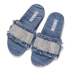 These stylish denim sandals are the perfect statement piece for any outfit. They feature a fringe accent, rhinestone detail, and a soft insole for all-day comfort. With a unique design and eye-catching details, these sandals will make a statement wherever you go. Made from high-quality denim, making them durable and reliable. denim sandals fringe accent rhinestone detail soft insole slider sandals denim sliders wide foot-friendly Runs big. Sizing down recommended! Model normal size is 7 1/2. Wea Denim Slippers, Ropa Upcycling, Denim Sandals, Slider Sandals, Shoes Hack, New Best Friend, Denim Shoes, Blue Sandals, Comfortable Sandals