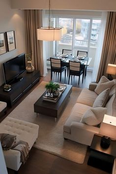 a living room filled with furniture and a flat screen tv