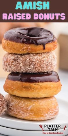 three glazed donuts stacked on top of each other