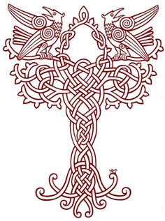 an intricate celtic cross with two birds on the top and one bird sitting on it's side