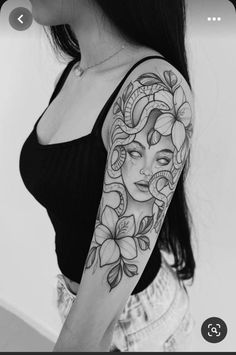 a woman with a tattoo on her arm