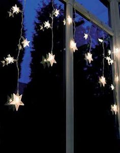 the window is decorated with stars and lights