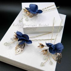 Beautiful and elegant, these delicate hand-wired hairpins are adorn with multiple white beads, silk flowers and pearls. The twisted wires are easy to adjust according to your most desired hair style. Sold as a set of 3 blue floral U-shaped hair pieces as pictured. The set makes a beautiful choice for a variety of occasions besides weddings. Match these adorable pieces to your outfit for the most feminine and chic spring fashion.DETAILS:Hand wired with fabric petals, pearls and beads.Sold as a se Pearl Bridesmaid Jewelry, U Shaped Hair, Spring Fashion Chic, Beach Jewelry Boho, Bridal Jewelry Necklace, Bride Flowers, Flower Hair Pin, Blue Bridesmaids, Bridal Hair Pins