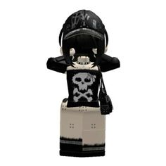 a black and white lego figure with a skull on it's chest, wearing a helmet