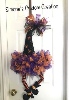 a door hanger decorated with purple, orange and black halloween wreaths that reads,'simone's custom creation '