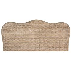 an upholstered headboard made out of wicker with a long, curved design