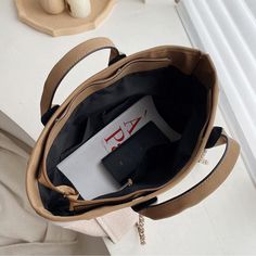 Brand Name: MR.YLLSShape: Casual ToteHandbags Type: Shoulder BagsTypes of bags: Shoulder & HandbagsOrigin: CN(Origin)Main Material: CanvasClosure Type: zipperHardness: SOFTStyle: CasualLining Material: PolyesterOccasion: VersatileGender: WOMENPattern Type: SolidNumber of Handles/Straps: SingleInterior: Cell Phone PocketInterior: Interior Zipper PocketDecoration: ChainsItem Type: Handbags