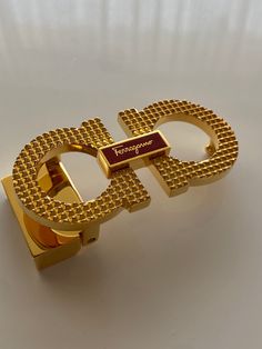 Authentic Vintage Salvatore Ferragamo Belt Buckle  The buckle is Gold Polished and comes with a pouch  Actual item on photos  Will fit 25mm wide belt straps  Ships anywhere in the World  Tracking will be provided Salvatore Ferragamo Belt, Ferragamo Belt, Suspender Belt, Wide Belt, Gold Polish, Belt Buckle, Suspenders, Salvatore Ferragamo, Belt Buckles