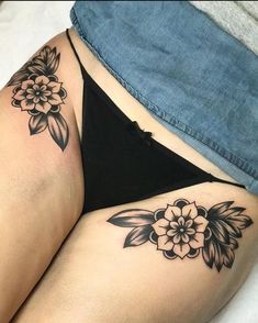 a woman's stomach with flowers on it