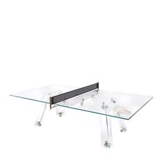 a ping pong table with glass top and metal legs