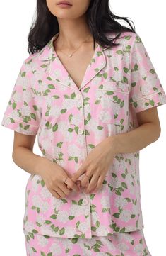 These jersey PJs are illustrated in a fun print that will have you dreaming sweetly in the comfort of your own bed. 26" top length; 25" inseam Top has front button closure; notched collar; short sleeves; chest patch pocket Pants have elastic/drawstring waist; side-seam pockets 93% organic cotton, 7% elastane Machine wash, tumble dry Imported Patterned Spring Sleepwear, Spring Patterned Sleepwear, Spring Patterned Sleepwear For Pajama Party, Patterned Sleepwear For Pajama Party In Spring, Floral Print Patterned Sleepwear For Loungewear, Feminine Floral Print Sleepwear For Lounging, Cute Floral Print Sleepwear For Pajama Party, Printed Pink Sleepwear For Home, Floral Print Sleepwear With Relaxed Fit For Bedtime