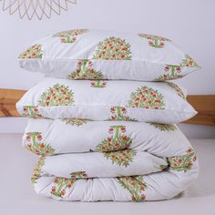 four pillows stacked on top of each other