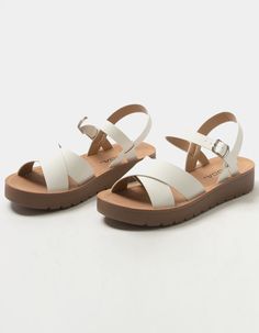 Soda Ankle Strap Mini Flatform Sandals. Faux Leather Upper. Crisscross Toe Straps. Ankle Strap With Buckle Closure. Mini Flatform Outsole. Rubber Sole. Padded Footbed. Approx. Platform: 1.25". Imported. White Platform Sandals, Mom Shoes, White Sandals Heels, Tan Sandals, Chunky Sandals, Stylish Sandals, Leather Sandals Women