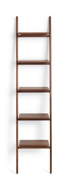 a wooden shelf with three shelves on each side