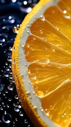 an orange slice with water droplets on it