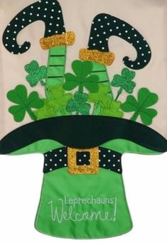 a st patrick's day pot holder with shamrocks